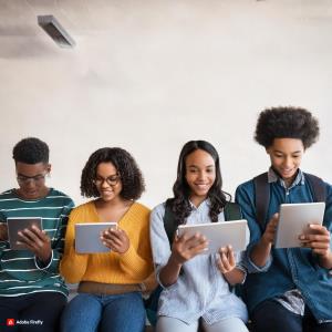 A group of Nigerian students using tablets; Bluerain School Management Software