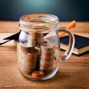 Coins in a jar placed on a table.; Bluerain School Management Software
